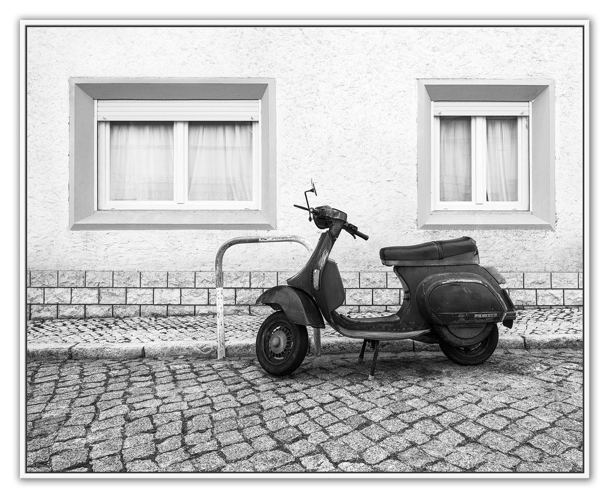 A Moped Along the Cobblestones